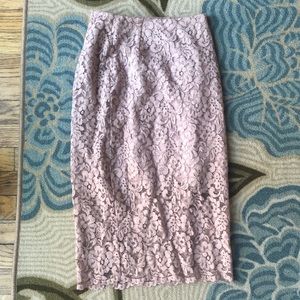Blush pink lace skirt with zipper in back. Brand new condition.